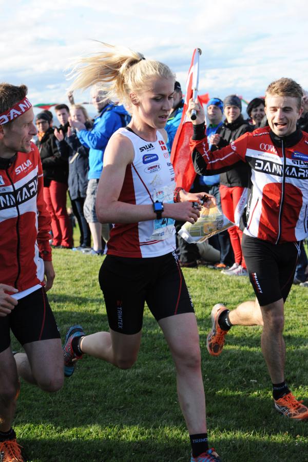 Maja Alm and Danish mix sprint team winning on Nairn Links, WOC2015
